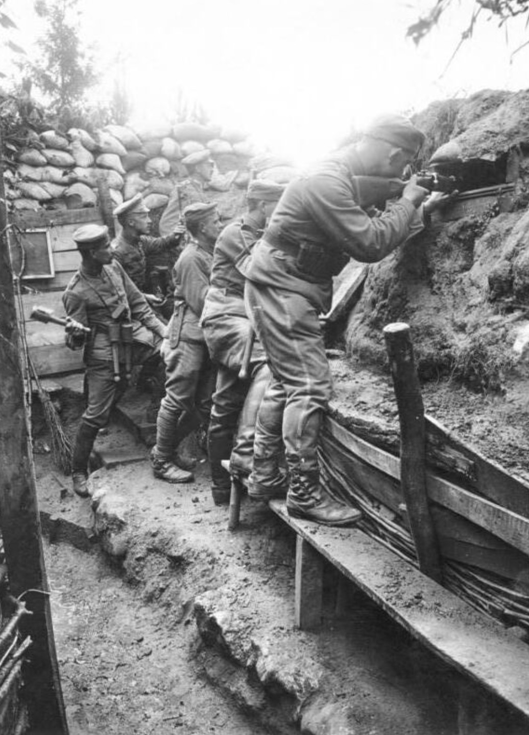 German soldiers of the 11th Reserve Hussar Regiment fighting from a trench on the Western Front 